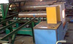 Pipe end induction heater for cylinder shrink